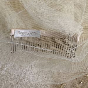 Reem Acra single layer cathedral veil with s floral and crystal detail.